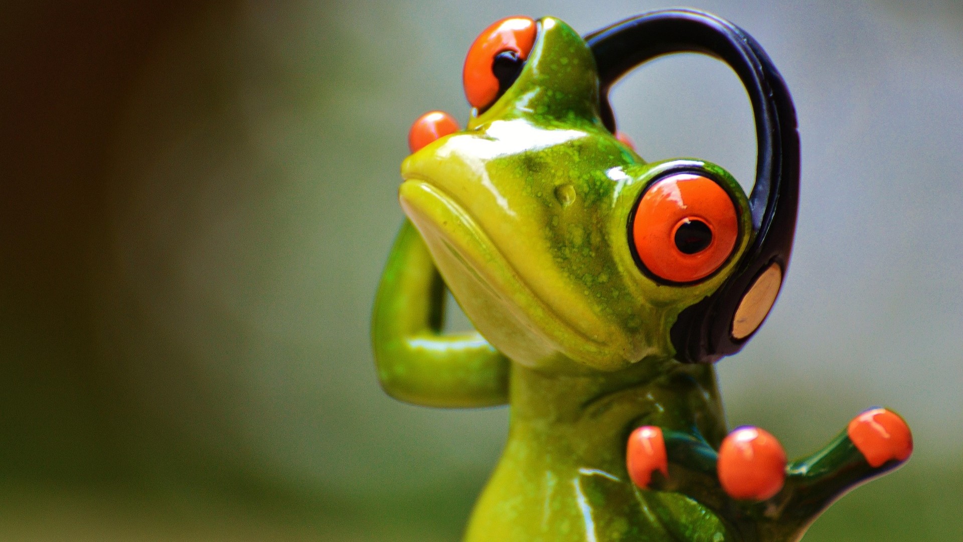 Frosch mit Kopfhörer